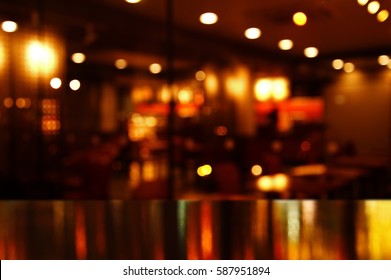 reflection light on table in bar and pub at night background - Shutterstock ID 587951894