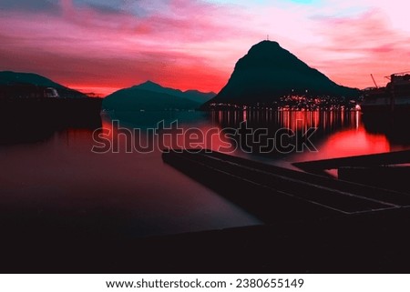 The reflection of the lights and the mountain in a lake captured in Parco Ciani, Lugano, Switzerland Zdjęcia stock © 