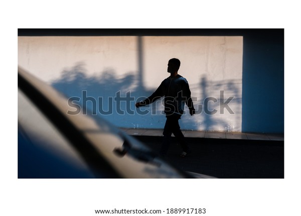 Reflection of a man in car\
window