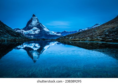 Reflection of the Matterhorn in the Riffelsee during dawn. 