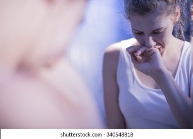 Reflection In Mirror Of Teenage Girl Feeling Sick 