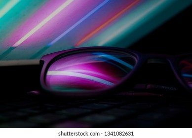 Reflection Of Monitor Screen On Glasses With Some Color Grades. 