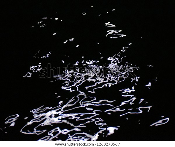 Reflection of moonlight in the water.\
Abstraction.\
Background.