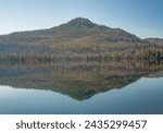 Reflection of Mount Hoffman in Snag Lake in Volcanic National Park