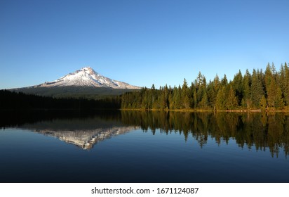 The Reflection Of Mount Hood In Trillium Lake At Sunset