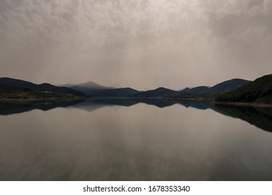 reflection of the mountains in a lake