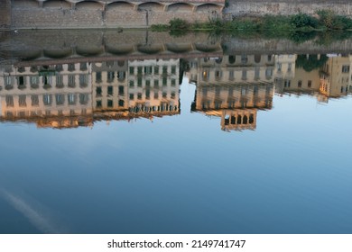 Reflection of multiple buildings in a river