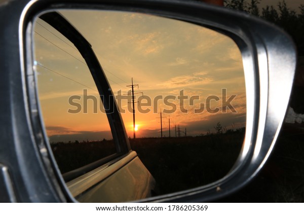 
reflection of nature in the
car mirror