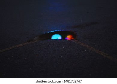 Reflection at night in a puddle