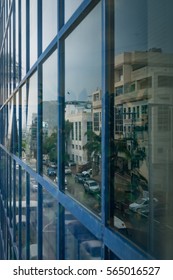Reflection - Office Building in Grid Windows of Skyscraper