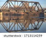 Reflection of old train bridge over the Snake River in Blackfoot, Idaho