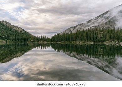 Reflection on Harvey Lake in the Holy Cross Wilderness, Colorado - Powered by Shutterstock