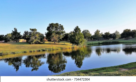 Reflection on pond at Sikes Lake in Wichita Falls, TX