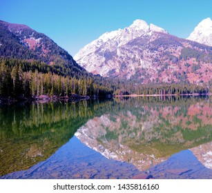 Reflection On Taggert Lake In The Great Tetons