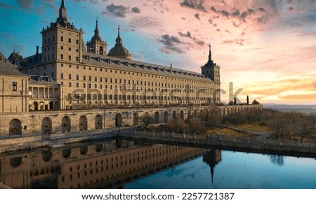 Reflection on the water of a pond of the majestic royal monastery of San Lorenzo de El Escorial of the sixteenth century, Spain