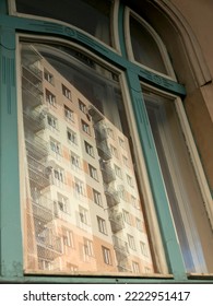 Reflection Of The Panel House In The Frame Of The Art Nouveau Window