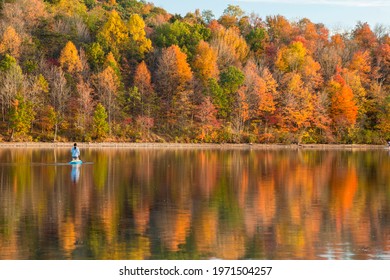 Reflection Of The Peak Autumn Foliage In Lake Habeeb In Rocky Gap State Park In Maryland