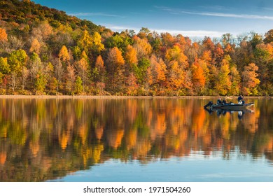 Reflection Of The Peak Autumn Foliage In Lake Habeeb In Rocky Gap State Park In Maryland