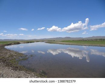 The reflection pf clouds in the river
