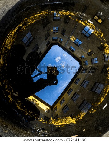 Similar – Schmales Fenster in der Steinmauer mit Blick auf das Pariser Stadtbild