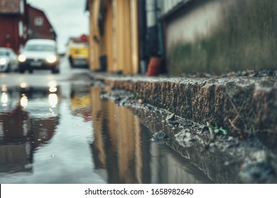 Reflection in puddle in city