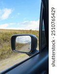 Reflection in a rearview mirror
