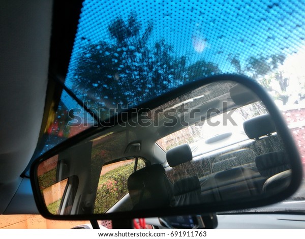 Reflection in the rearview mirror of the car,\
help to drive\
safely.