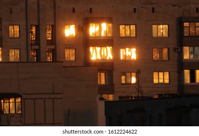 Reflection of the setting sun in the windows of residential buildings in the city of Yevpatoriya (Crimea, Crimean peninsula).