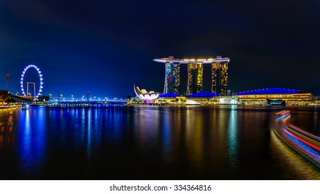 The reflection of Singapore City Skyline along Singapore River at Blue Hour