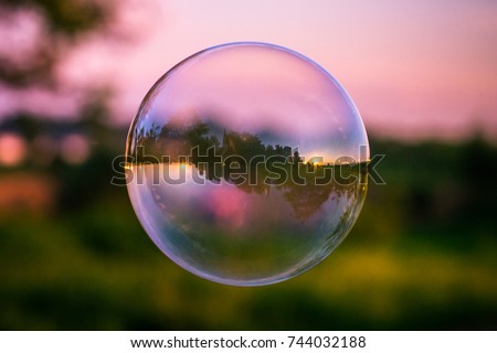 Reflection sky in the soap bubble