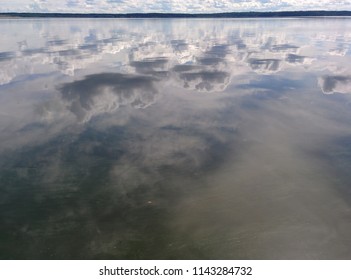 reflection of sky in water