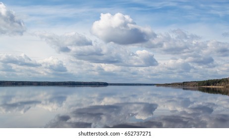 the reflection of the sky in the water