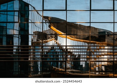 Reflection skyscraper in mirror glazing facade. Architecture details. Modern city background with metal and glass. Shopping mall, office of finance building. Endless rows of panoramic windows.