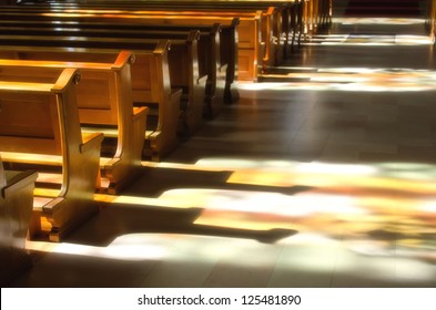 Reflection Of The Stained Glass In The Church