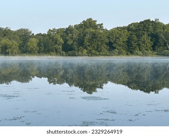 Reflection of Stony Creek Lake in Michigan.
