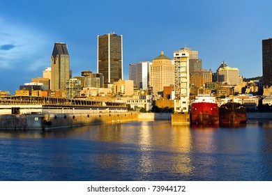 Reflection Of The Sun At Daybreak, On Part Of The Port And City Of Montreal.