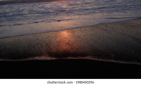 Reflection of Sun in Waves
