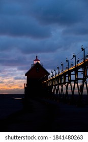 Reflection Of Sunset At Lake Michigan, Grand Haven Lighthouse 