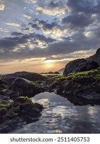 reflection of sunset light on the beach 