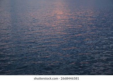 Reflection of the sunset in the water surface