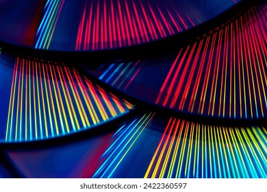 Reflection of the surface of a DVD discs with artistic lighting close-up - Powered by Shutterstock