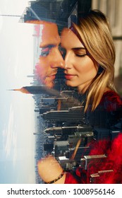 Reflection of tender hugging couple in a window with great view on the New York city