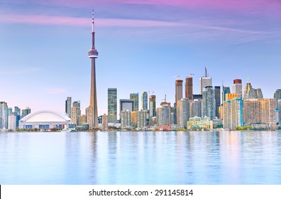 The Reflection Of Toronto Skyline At Dusk In Ontario, Canada