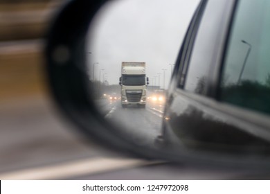 Reflection Of Traffic Behind In Wing Mirror