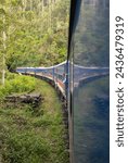 Reflection of the train from Kandy to Ella from the doorway while passing through a tunnel, Central Province of Sri Lanka