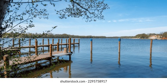 reflection of trees in the lake, Mecklenburg Lake District - Powered by Shutterstock