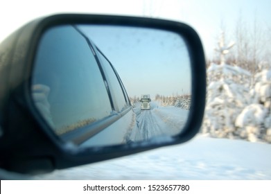 Reflection Of Truck In Back Wing Mirror At Winter Road Tractor Unit