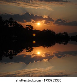 A Reflection Of A Tucson Sunrise Over The University Of Arizona Campus