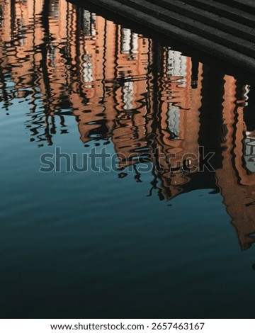 Reflection of Wapping Canal in London