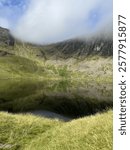 Reflection in water, Stickle Tarn, Lake District